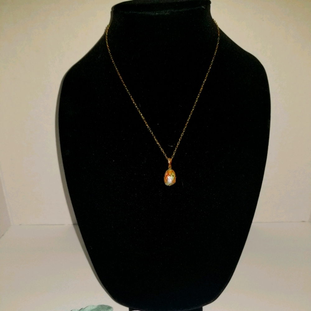 Avon colorful egg necklace with bag